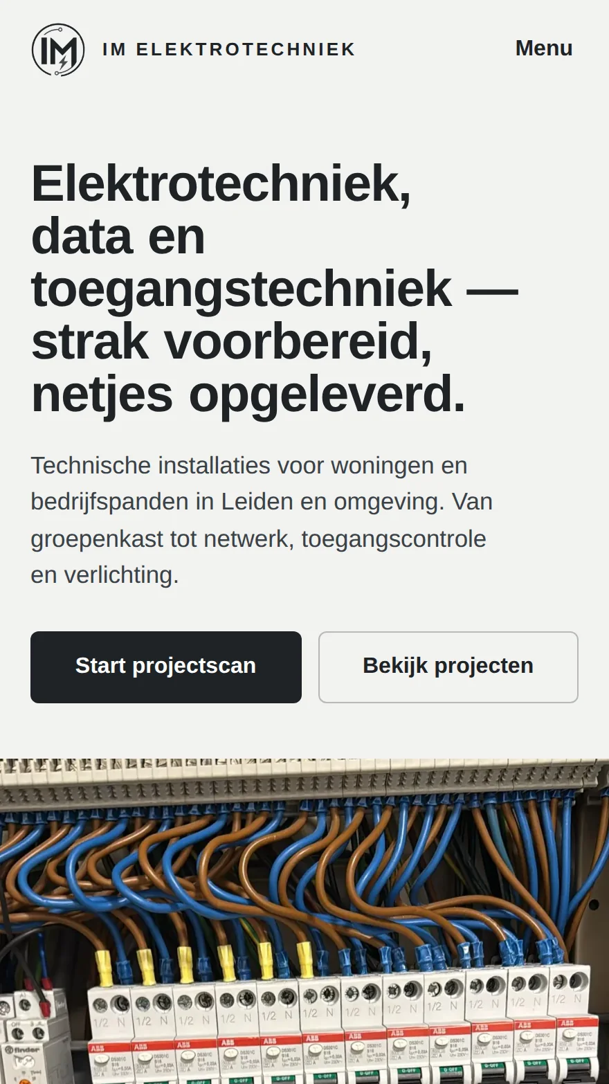 Schermafbeelding van de website van IM Elektrotechniek op mobiel: de kop “Elektrotechniek, data en toegangstechniek — strak voorbereid, netjes opgeleverd” en de knoppen “Start projectscan” en “Bekijk projecten”
